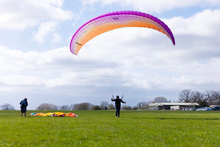 Paraglider launching on the training field