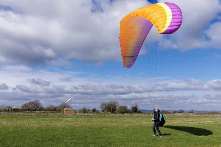 Paramotor student controlling the wing before launch