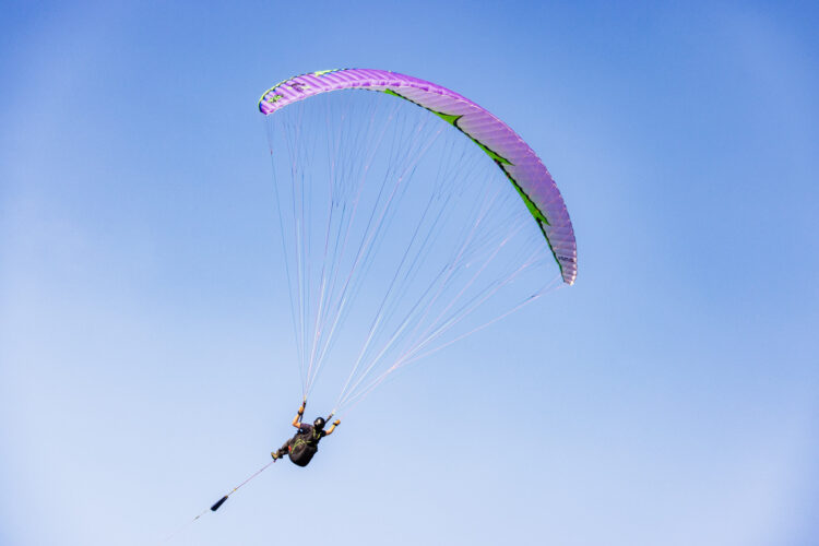 Tandem paraglider in flight