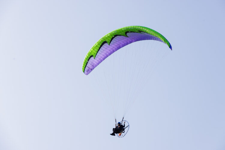 Powered paraglider in the distance
